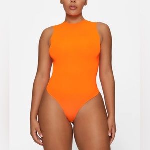 skims body suit size medium